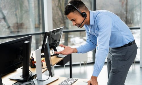 close-up-person-working-call-center_23-2149288220